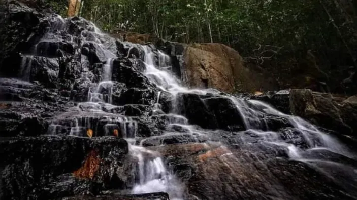 Explore Mount Lengkuas Waterfall, a tourist attraction that offers beauty